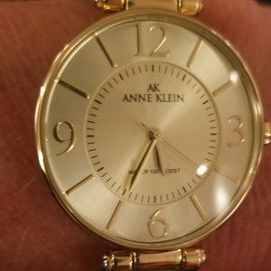Anne Klein Watch. Ladies with a tan/brown leather band.